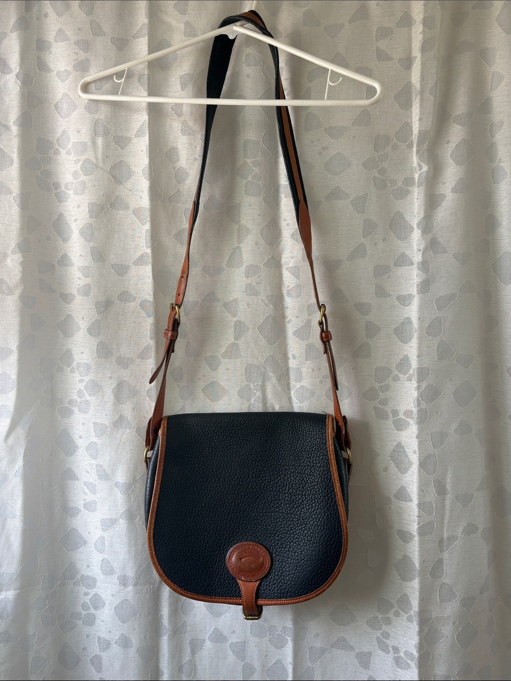 Vintage Dooney and Bourke Navy blue and tan Leather saddle crossbody Bag